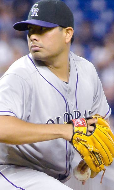 Jorge De La Rosa sets Rockies' win record by beating Marlins